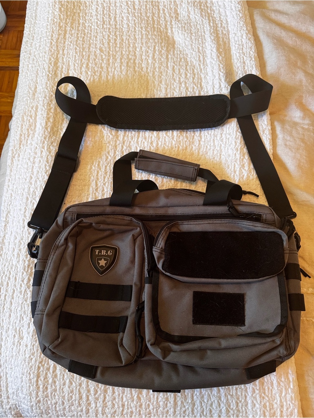 Gray Tactical diaper bag with changing pad